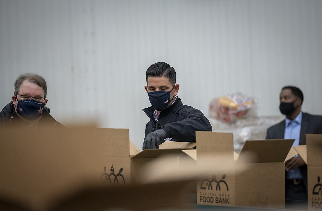 Acting Secretary Wolf Volunteers at the Capital Area Food Bank (50695220808)